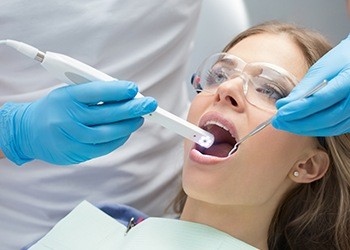 Capturing images of patient's teeth using intraoral camera