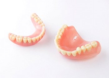 A full set of dentures created for the upper and lower arches