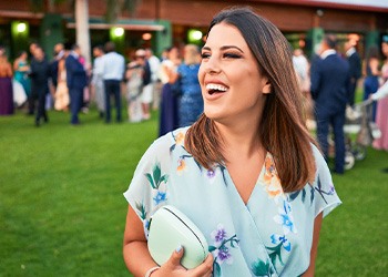 Closeup of wedding guest smiling