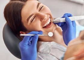 Woman smiling in the dental chair
