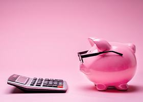 Piggy bank and calculator