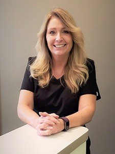 Dental office manager Mary Beth