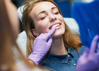 Woman receiving dental exam