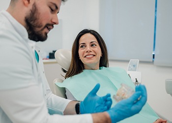 Woman smiling in the dental chair
