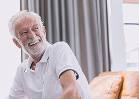 Man laughing with dentures