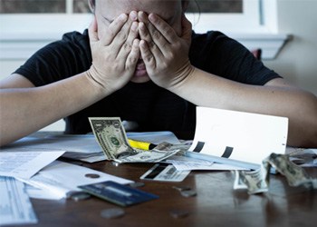 Woman stressed about money