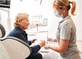 Woman seeing dentist in Crown Point