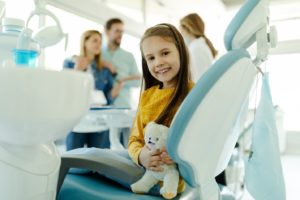 Child at the dentist for a tooth extraction.