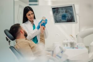 Patient asking dentist questions. 